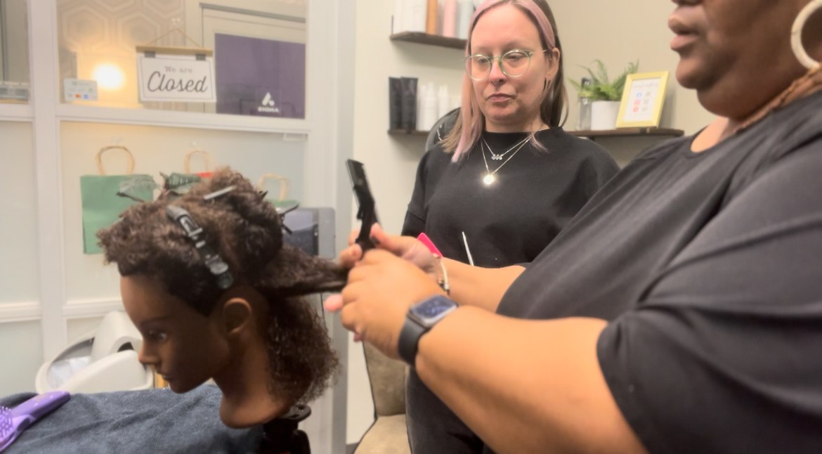 Hands-on hairstyling instruction for beauty professionals